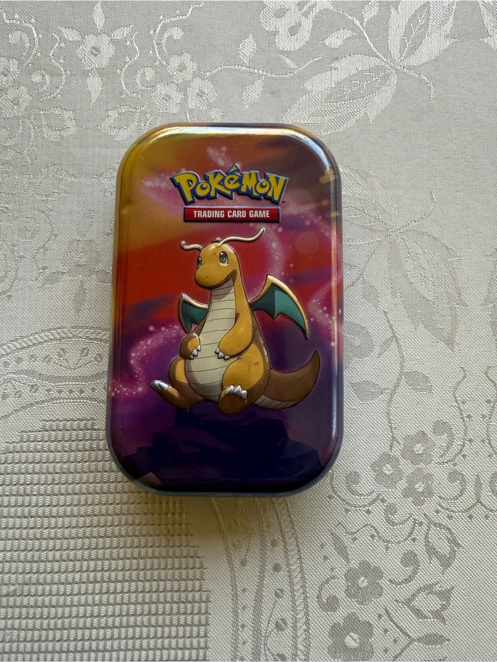 Pokemon Mini Tin Case with Yellow Dragonite and Purple-Orange Gradient